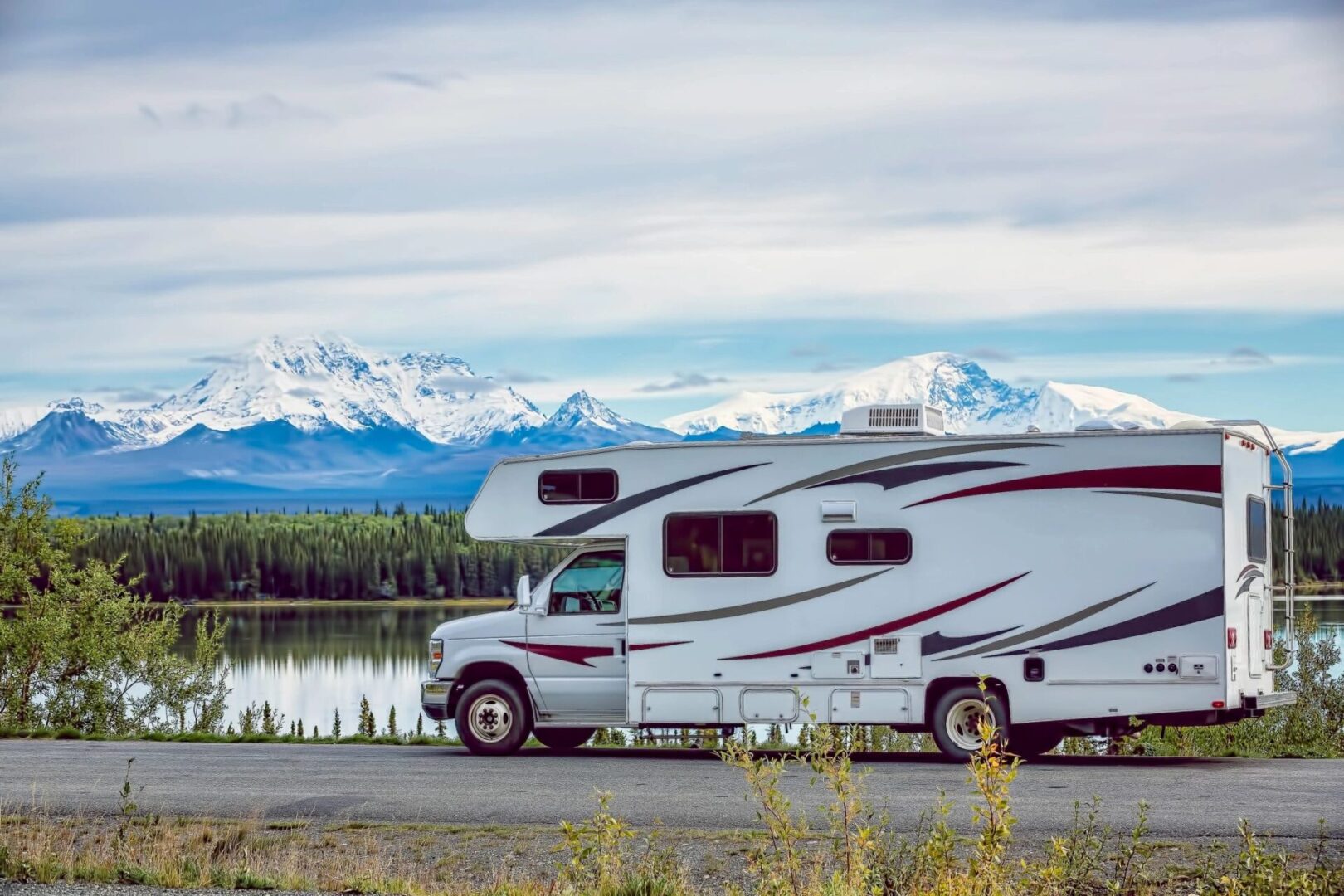 camper by mountains