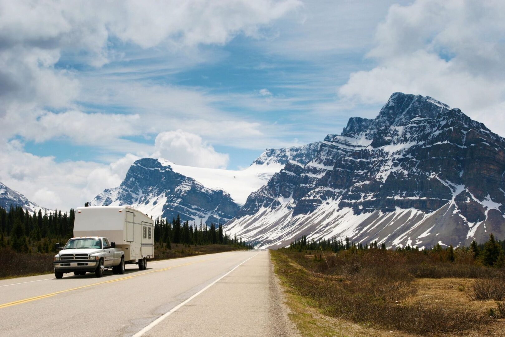 camper by mountains